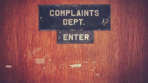 Complaints department sign
